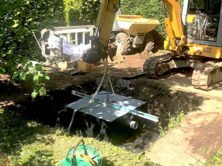 Positioning a Matrix sewage treatment plant at a property in Cranleigh Surrey