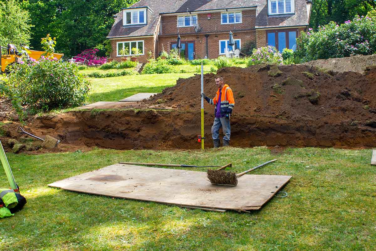 Creating a drainage field on a steeply sloping site in Hampshire