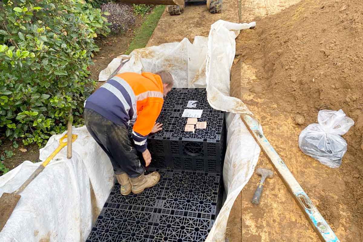 CESS installing a new rainwater soakaway in Godalming Surrey